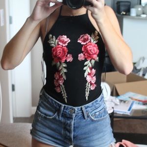 Rose bodysuit.